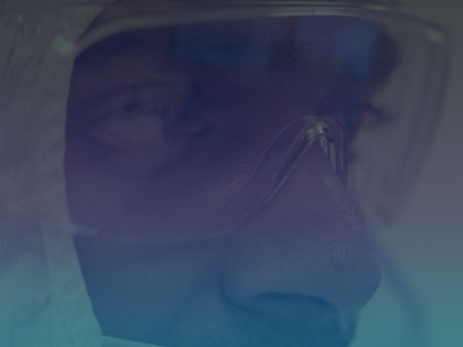 A photo of a Penn State researcher wearing protective gear